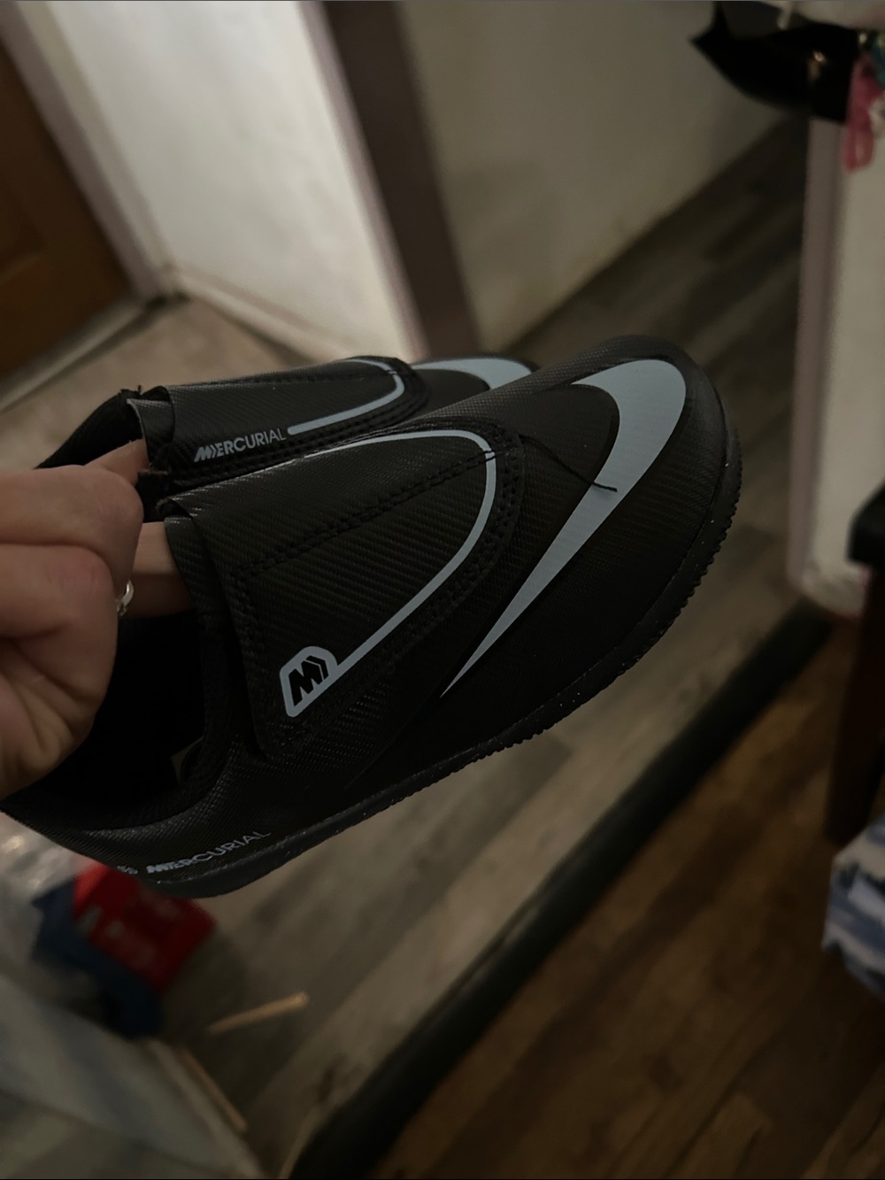 Nike Black Soccer Slip-On Cleats with White Swoosh
